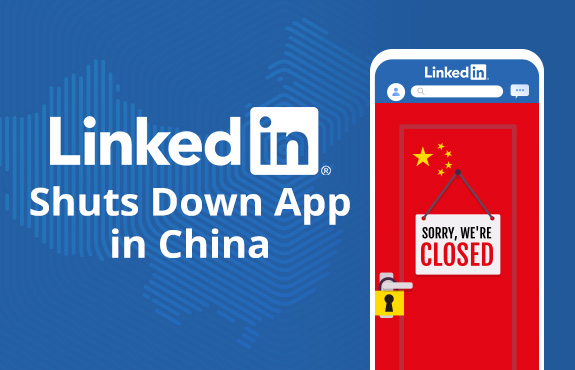 LinkedIn App Displaying in Phone With China's Flag on Door Locked With Sorry We're Closed Sign