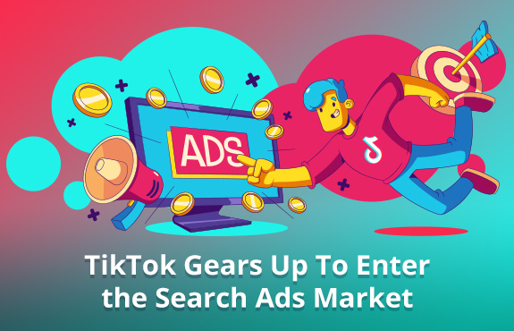 Person Wearing TikTok Shirt Pointing to Ads On Computer Representing TikTok Entering the Search Ads Market